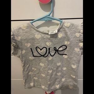 Gray LOVE shirt for a baby girl